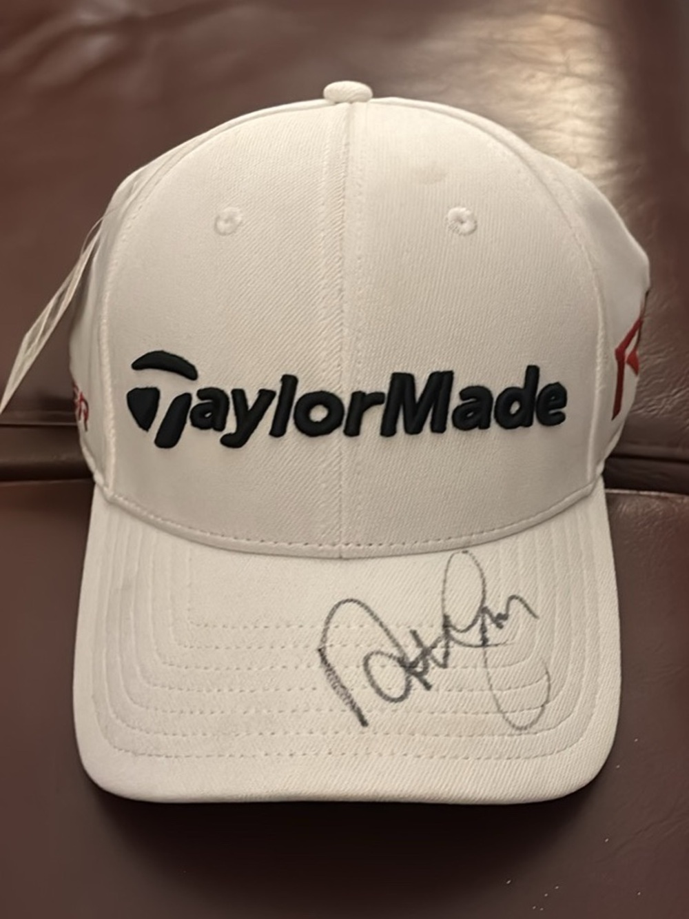 TaylorMade White Cap with Black Logo and Signature by Natalie Gulbis